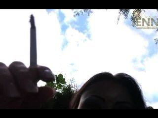 Jenny Smoking Outdoors